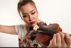 kayaa-standing-playing-violin