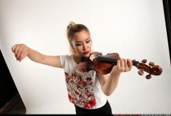 kayaa-standing-playing-violin