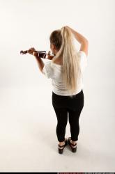 kayaa-standing-playing-violin
