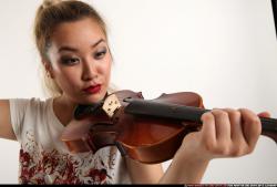 kayaa-standing-playing-violin