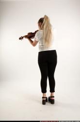 kayaa-standing-playing-violin