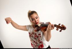 kayaa-standing-playing-violin