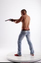 Regelio-standing-aiming-pistol