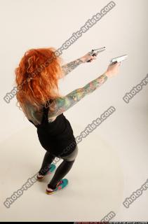 2016 12 ZORA DUAL PISTOLS POSE5 SHOOTING 05 A