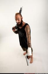 edgar-standing-aiming-shotgun-pistol