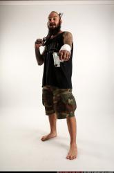 edgar-standing-aiming-shotgun-pistol