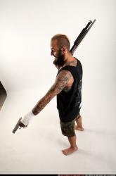 edgar-standing-aiming-shotgun-pistol
