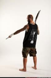 edgar-standing-aiming-shotgun-pistol