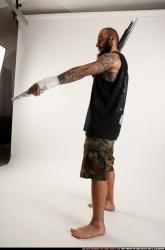 edgar-standing-aiming-shotgun-pistol