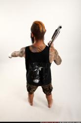 edgar-standing-aiming-shotgun-pistol