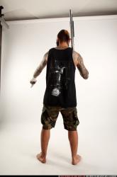 edgar-standing-aiming-shotgun-pistol