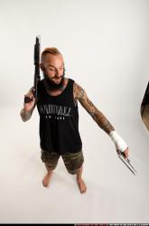 edgar-standing-aiming-shotgun-pistol