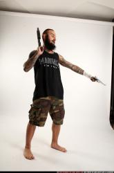 edgar-standing-aiming-shotgun-pistol