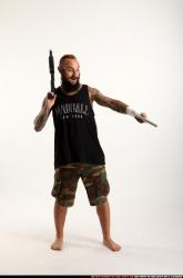 edgar-standing-aiming-shotgun-pistol