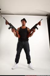 Ron-tommyguns-pose1