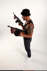 Ron-tommyguns-pose1