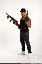 Ron-tommyguns-pose1