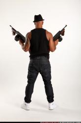 Ron-tommyguns-pose1