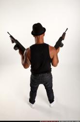 Ron-tommyguns-pose1