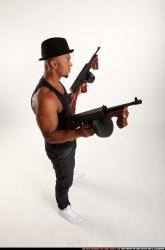 Ron-tommyguns-pose1