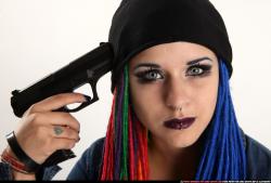 dolores-sitting-pistol-pose