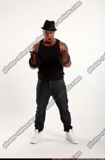 Ron-tommyguns-pose2