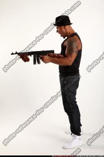 Ron-tommyguns-pose2