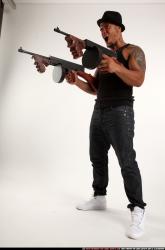 Ron-tommyguns-pose2