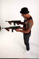 Ron-tommyguns-pose2