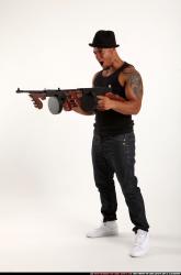 Ron-tommyguns-pose2