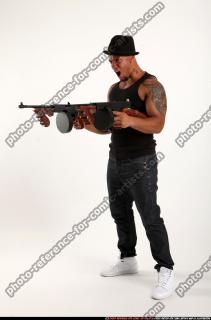 Ron-tommyguns-pose2