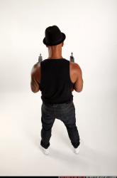 Ron-tommyguns-pose2