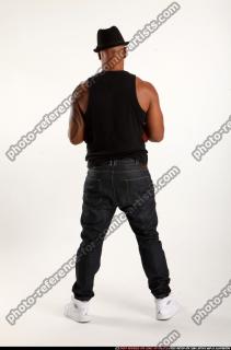Ron-tommyguns-pose2