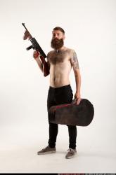 oscar-tommygun-case-pose