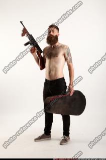 oscar-tommygun-case-pose