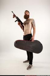 oscar-tommygun-case-pose