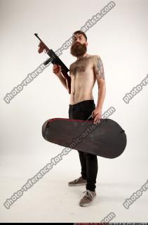 oscar-tommygun-case-pose