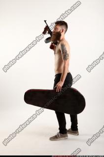 oscar-tommygun-case-pose