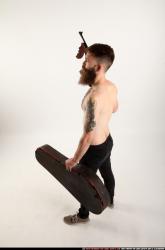 oscar-tommygun-case-pose