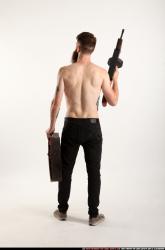 oscar-tommygun-case-pose