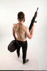 oscar-tommygun-case-pose