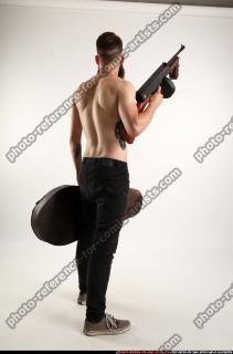 oscar-tommygun-case-pose