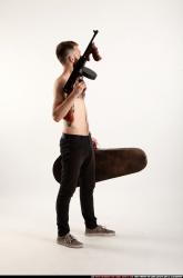 oscar-tommygun-case-pose