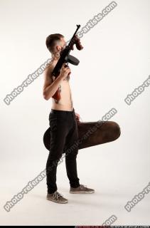 oscar-tommygun-case-pose