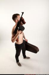 oscar-tommygun-case-pose