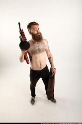 oscar-tommygun-case-pose