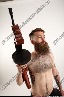 oscar-tommygun-case-pose