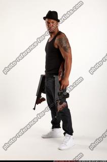 Ron-tommyguns-pose3