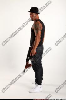 Ron-tommyguns-pose3