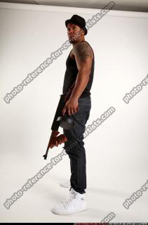 Ron-tommyguns-pose3